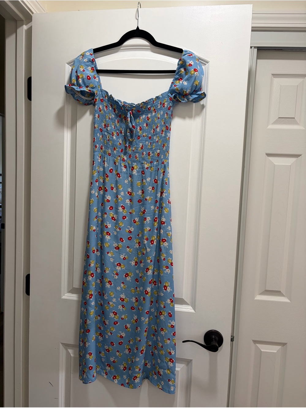 Faithfull The Brand Castilo Smocked Midi Dress in Blue Jasmine Floral.